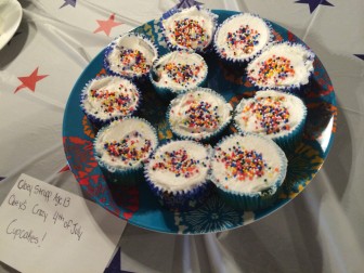 Cloey's Crazy Fourth of July Cupcakes — with tie-dye red, white & blue inside.