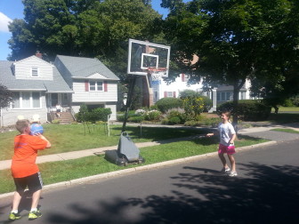 Kasdan family at their curbside basketball hoop
