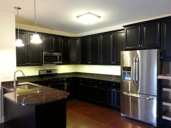 A kitchen in a 2-bedroom apartment at the Gateway