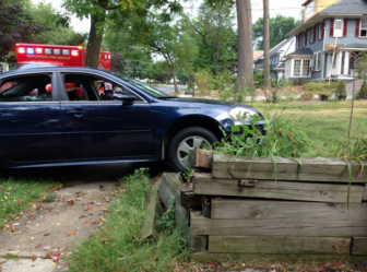 September 6, 2014: Vehicle crashed into wooden garden wall at 709 Prospect St.