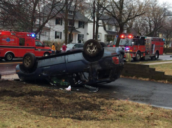 March 30, 2014: Vehicle hits tree and curb and flips over into driveway of 707/709 Prospect St.