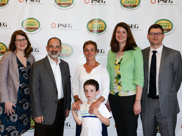 Pictured from left to right: Heather McCall, Director, Sustainable Jersey for Schools; Russell J. Furnari, Manager Environmental Policy Enterprise, PSEG;  Maggie Tuohy and a little Tuohy; Lisa Gleason, Stakeholder Engagement Specialist, PSEG; Randall Solomon, Co-Director, Sustainable Jersey