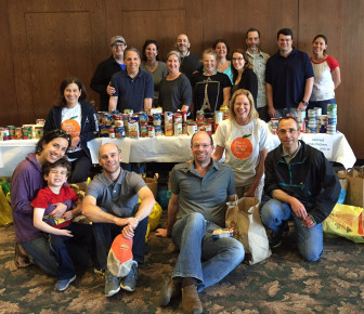 Temple Sharey Tefilo-Israel volunteers sort donations for Interfaith Food Pantry of the Oranges. 