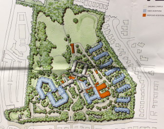 This site plan shows additions made in the 1990s in blue. New proposed additions are in orange.