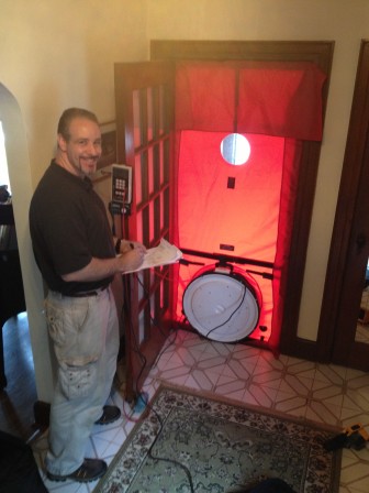 State certified contractor conducts "Blower Test" as part of the energy audit at the Leventhal House.