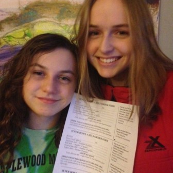 Lena and Emma Finnamore raise funds for Morrow Church youth groups with Super Bowl Chili sale.