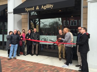 D&I Fitness owners Delon and Terri Nelson cut the ribbon at its South Orange Ave. location