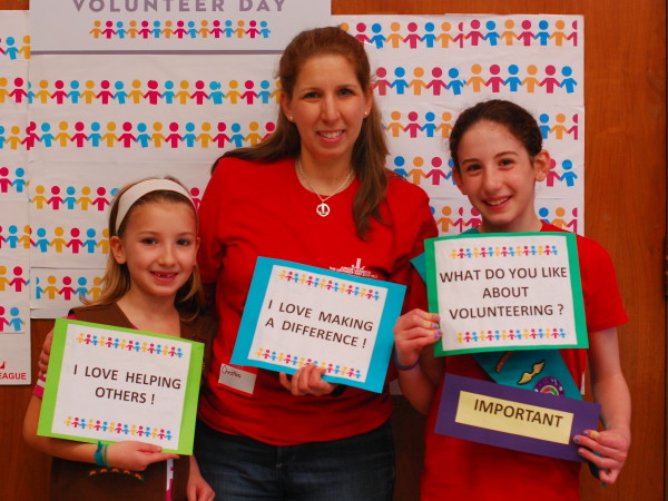 JLOSH President Christina Connant of Short Hills and her daughters express their thoughts on volunteering and how it makes them feel at the 4th Annual Kids For Kids Event organized by JLOSH.