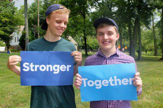 Stephen Lehren, left, a rising sophomore at CHS, with a friend at the JSA Presidential Election Symposium. 