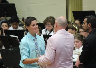 Mr. Smith gives Zach Doubek his 8th grade certificate. 