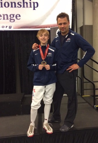 Jack Woods on Left and Coach Serge Vashkevich on Right at the Summer National Fencing Championships in Dallas from Krysia Woods.