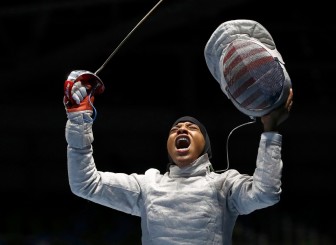 Ibtihaj Muhammad in the 2016 Olympics (credit Lucy Nicholson, Reuters)